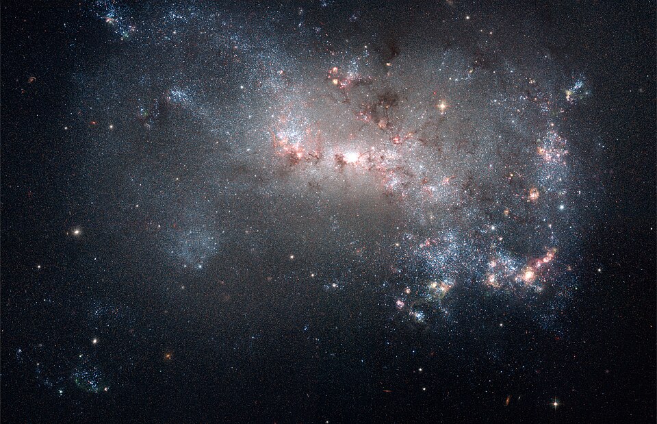Zdjęcie ilustracyjne: Starburst in NGC 4449 (captured by the Hubble Space Telescope).jpg
