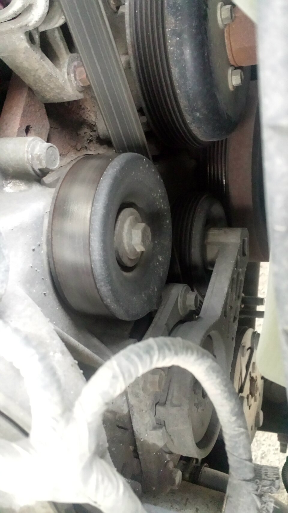 Zdjęcie ilustracyjne: Belt tensioner (15973554259).jpg